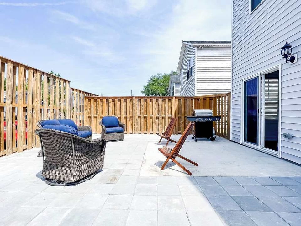 Fenced in yard and patio with BBQ
