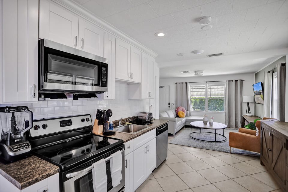 View of the kitchen going to the living room