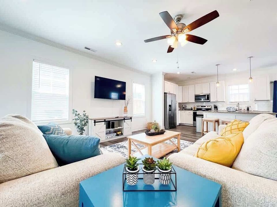 Living room home #1 with bright blues and yellows
