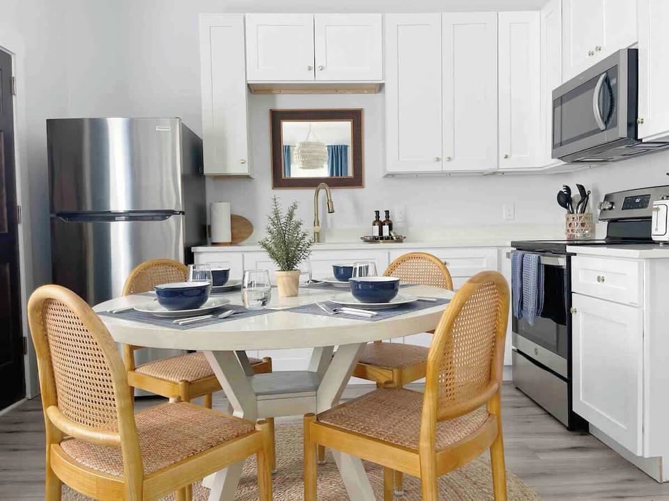This cozy kitchen corner blends seamlessly into the open layout, offering all the essentials for meal prep and cooking without feeling cramped.
