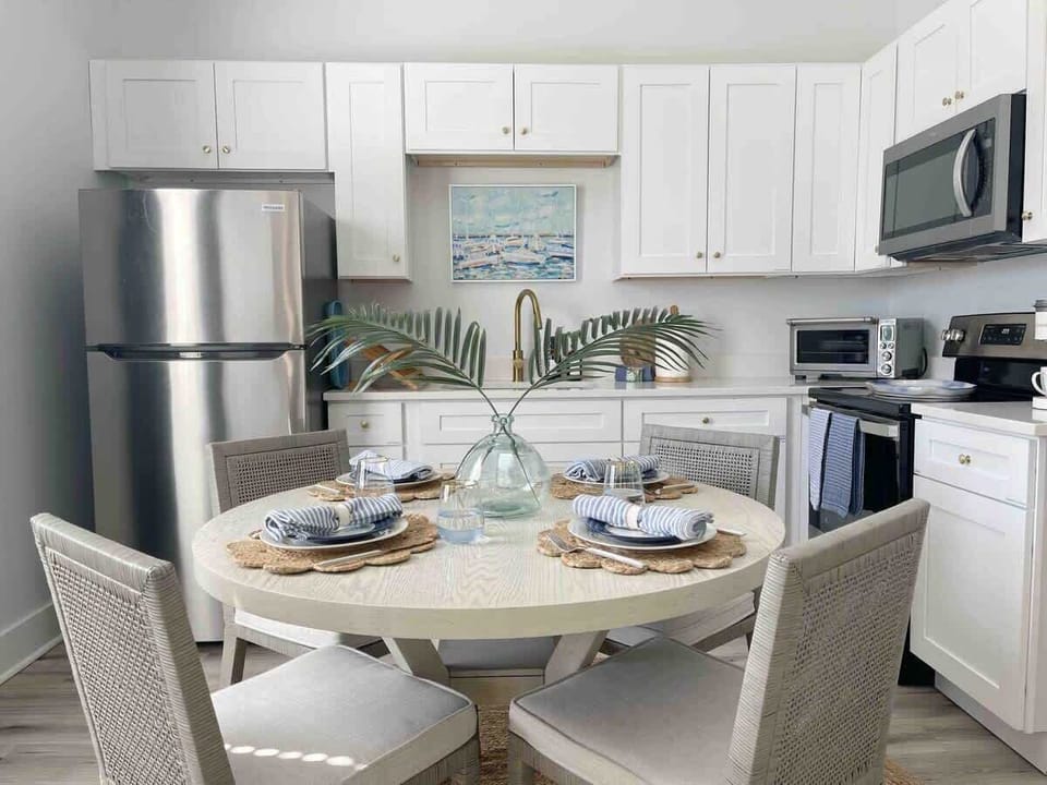 A cozy table right in the kitchen makes for convenient and quick breakfasts or late night snacks. 