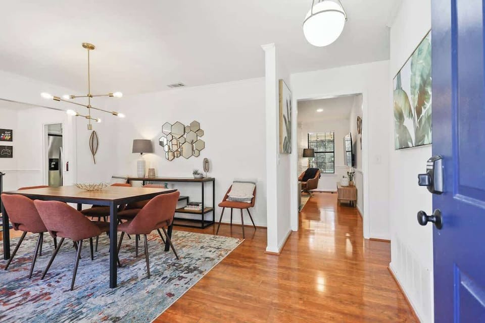 Come on In! Step inside to a light-filled, entertainer's paradise, with a clear view into the cozy living space.