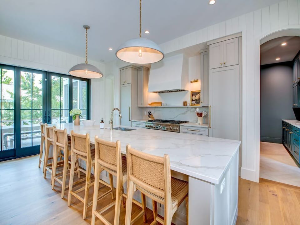 Large kitchen island with bar stools