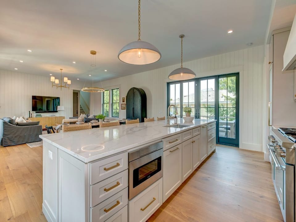 Large kitchen island with bar stools