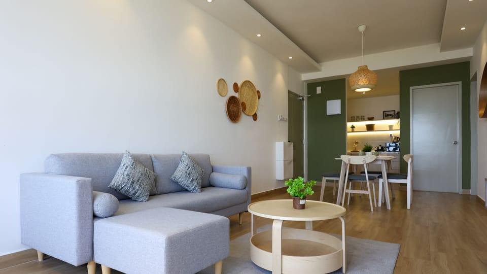 Premium Apartment, 2 Bedrooms, Pool Access, Sea View | Living area | 55-inch flat-screen TV with cable channels, Netflix, table tennis