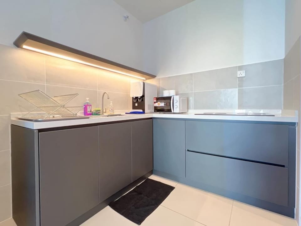 Apartment | Private kitchen | Fridge, stovetop, cookware/dishes/utensils, cleaning supplies