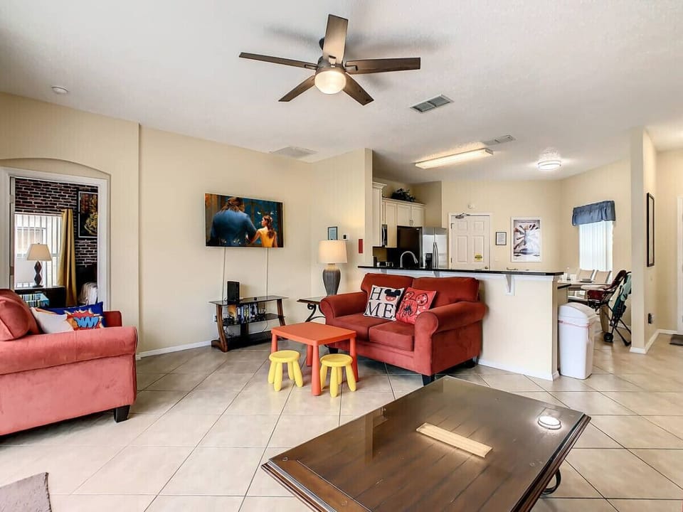 Relax in a Spacious Living Room with Smart TV Entertainment