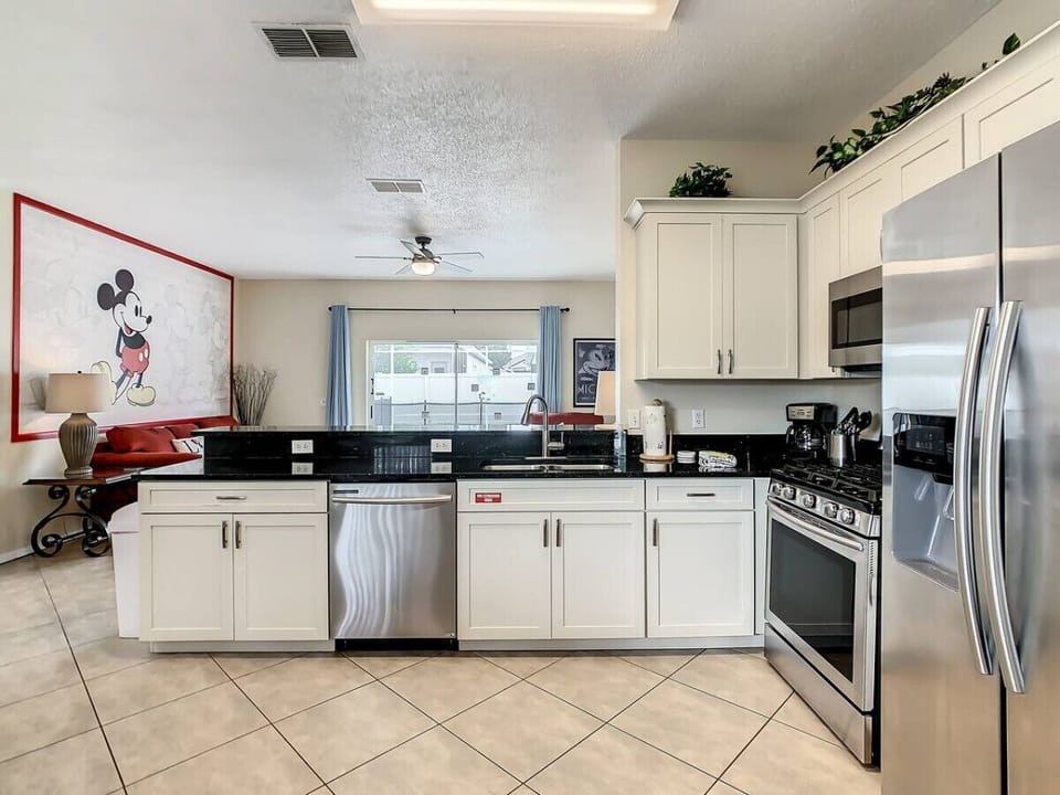 Unwind in our single level home, complete with a full kitchen and vibrant theme park attractions just steps away