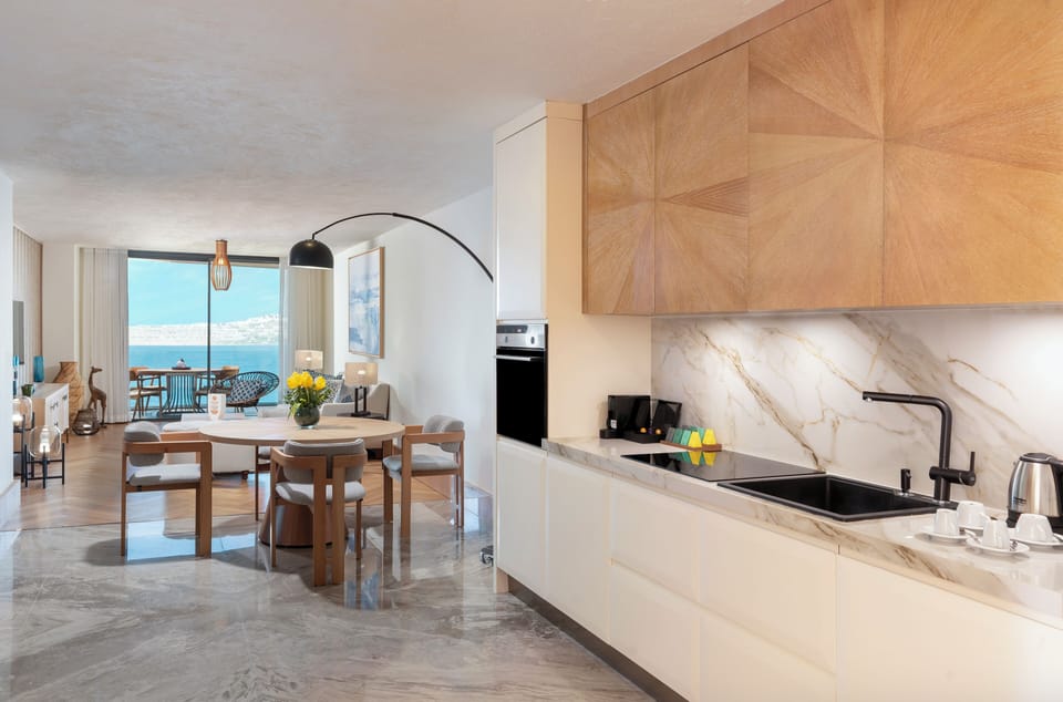 Family Suite, 3 Bedrooms, Sea View | Private kitchen | Coffee/tea maker, electric kettle, highchair