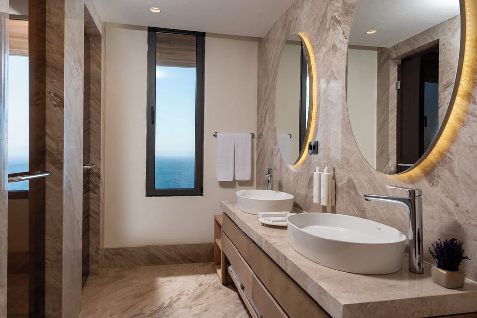 Shower, eco-friendly toiletries, hair dryer, bathrobes
