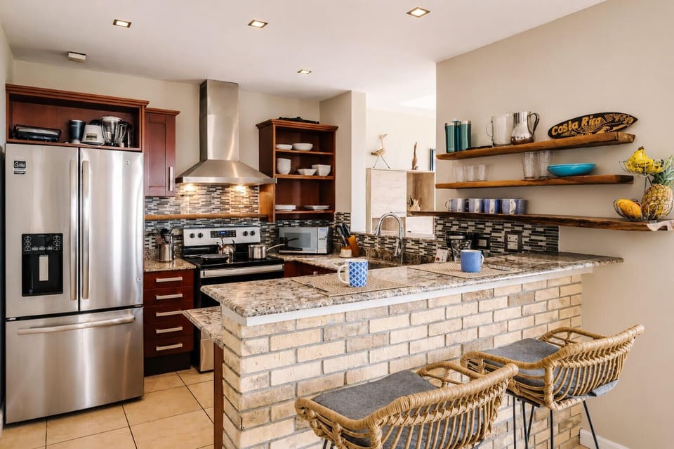 Breakfast bar opens to dining room