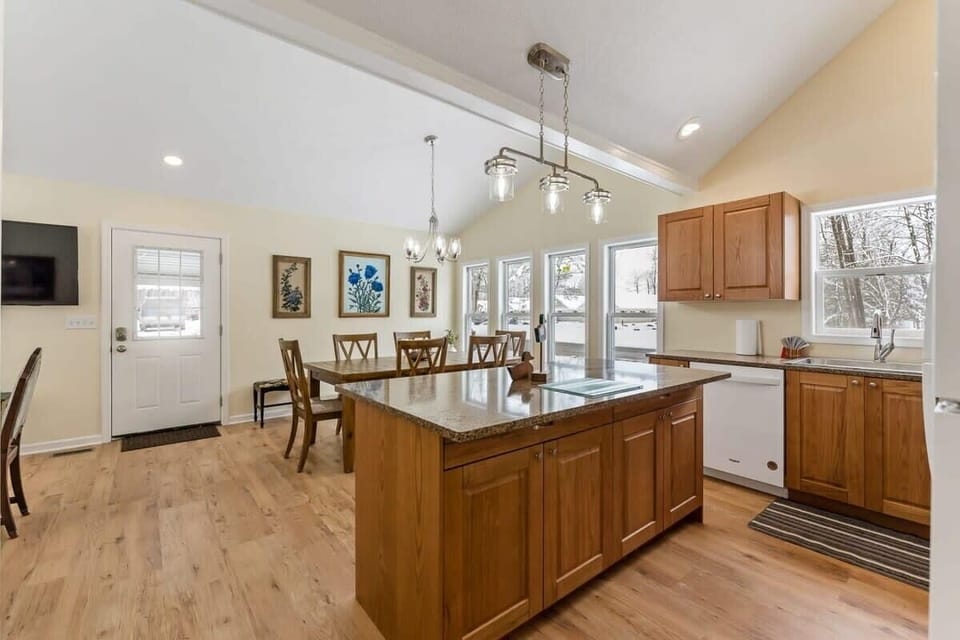 In the Lucky Duck Cottage kitchen, looking into the dining area