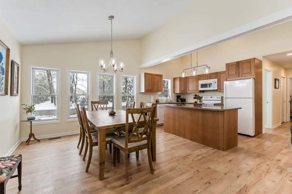 The Lucky Duck Cottage dining area and kitchen, as seen from the living area of the great room