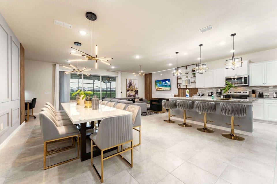 Experience luxury in this open-plan kitchen and dining area, perfect for entertaining and family gatherings.