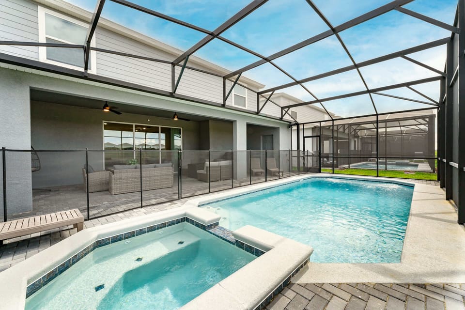 Relax in your private screened pool and hot tub, perfect for family fun or unwinding after a day of adventure.