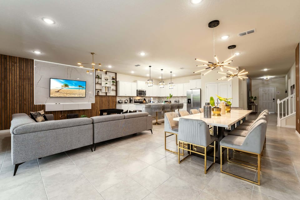 Experience luxury in this expansive living area with modern decor, perfect for entertaining and relaxation.