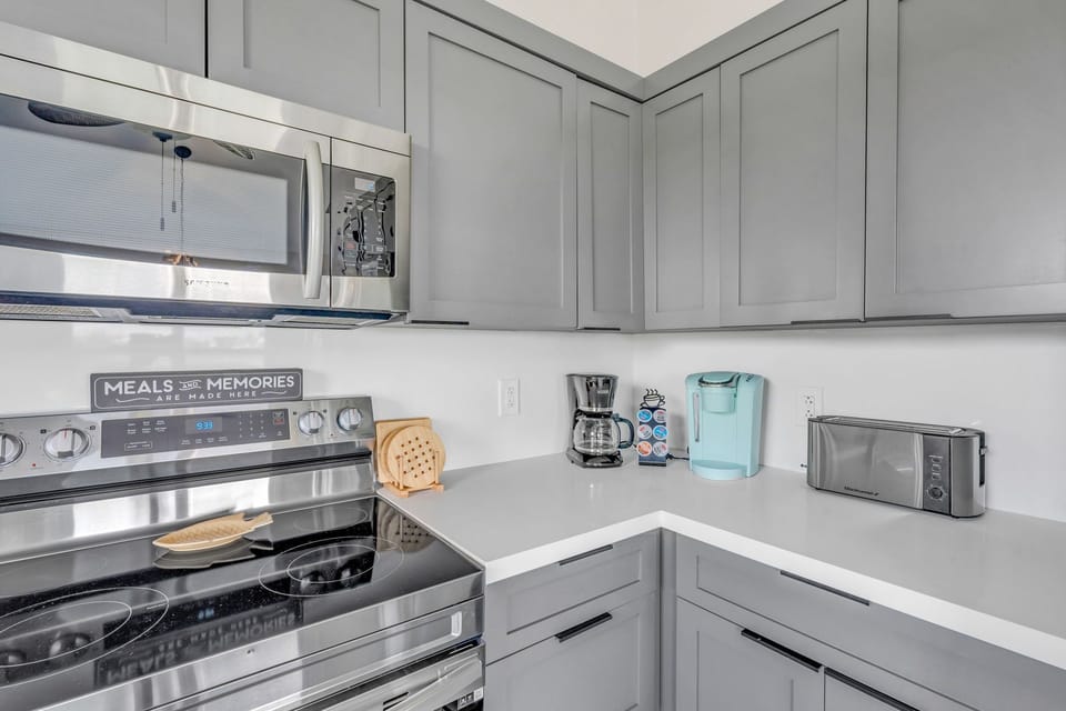 kitchen with both drip and keurig coffee machine