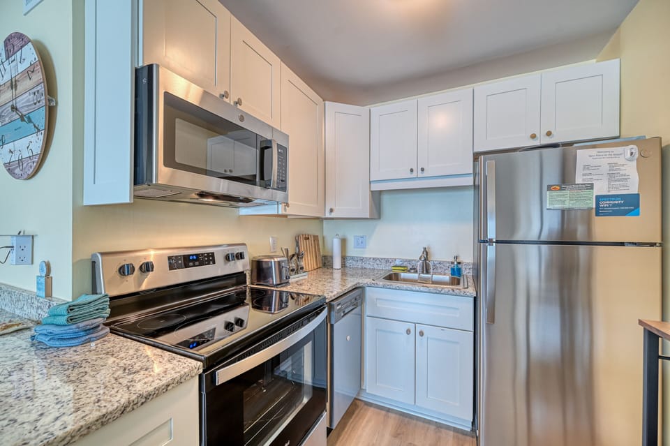 Fully stocked kitchen outfitted by someone who likes to cook and uses it often.