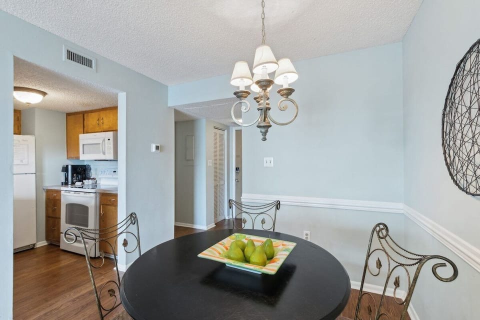 Dining Room for Four at Down by the Sea, a beachfront Sand Dollar Villas vacation condo.