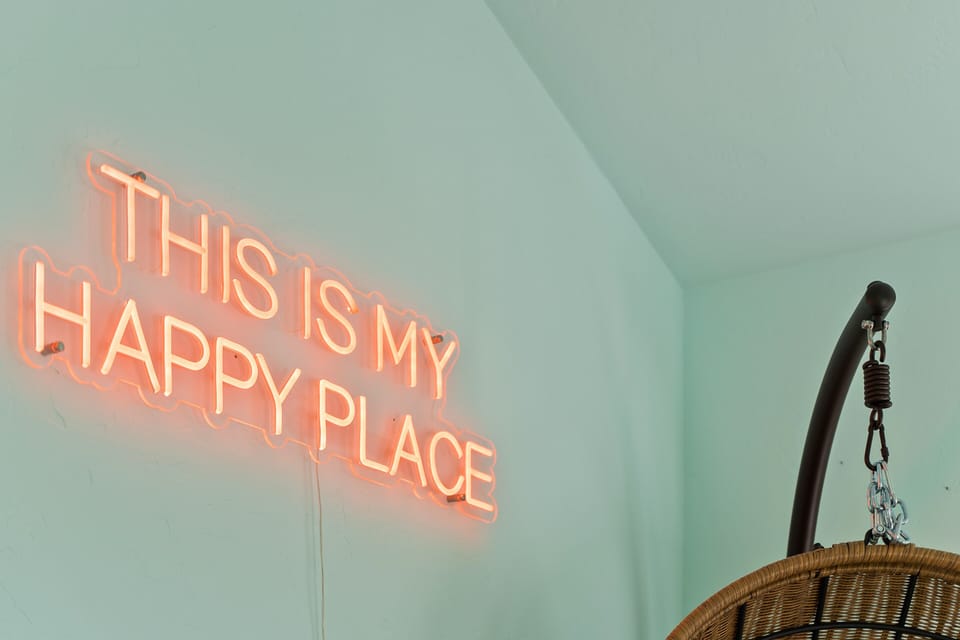 “This is My Happy Place” neon sign - your spot for that Instagram photo!