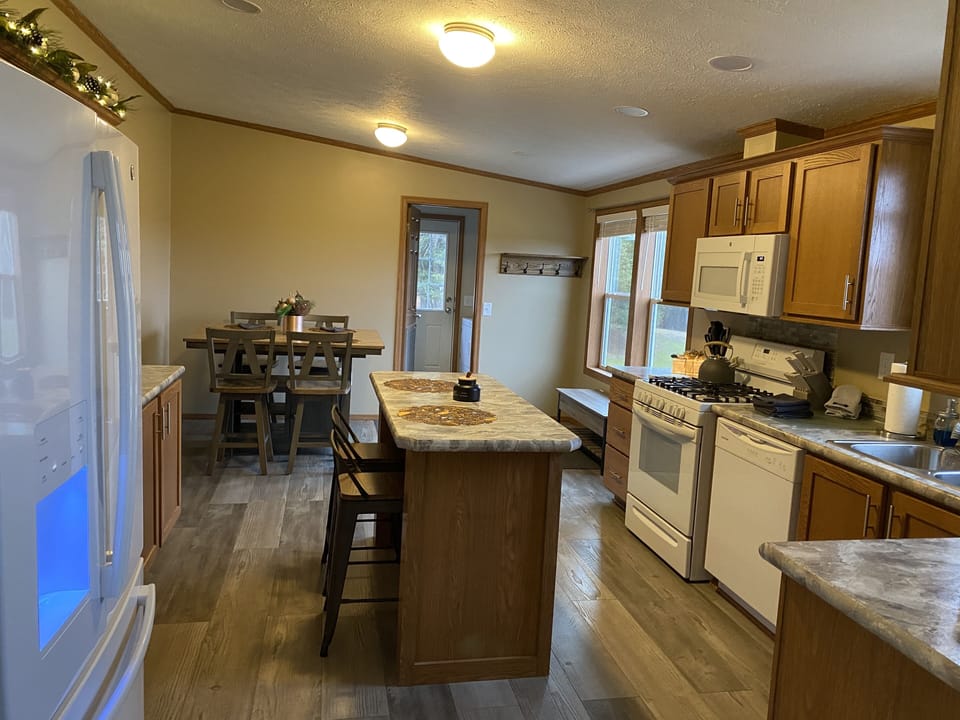 eat in kitchen. seating for 6 with table/bar (additional bar stools to make 8)
