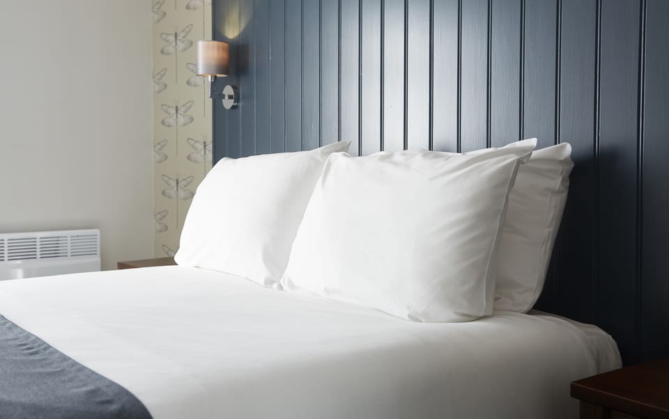 Double Room | Desk, blackout drapes, iron/ironing board, free WiFi