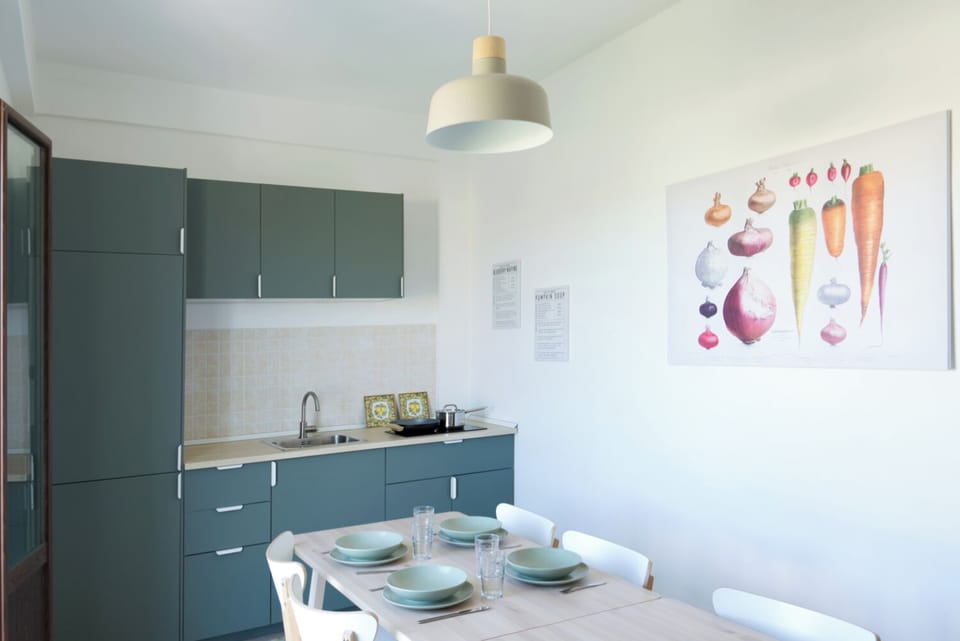 Apartment | Private kitchen | Full-size fridge, stovetop, espresso maker, coffee/tea maker