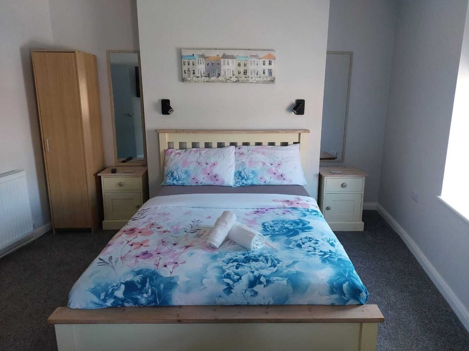 Comfort Room, 1 Bedroom, Ensuite, City View (Family Room 1st Floor ) | Blackout drapes, soundproofing, iron/ironing board, free WiFi