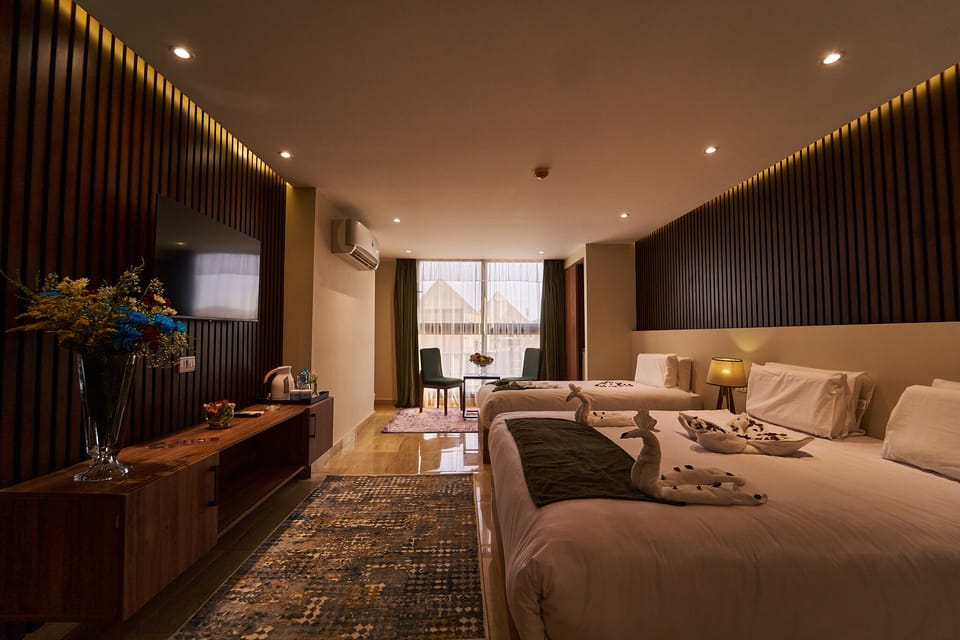 Family Room, Mountain View | Minibar, soundproofing, free WiFi, bed sheets