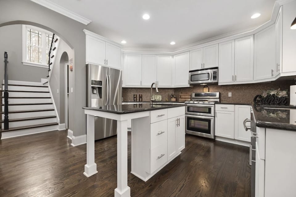 Full view of our chefs kitchen, showing our stairs going up to our second level.