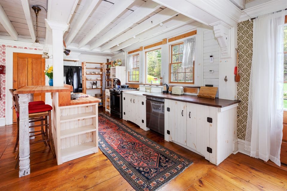 Mind blowing farm kitchen overlooking the lawn, garden and the Catskill woods.