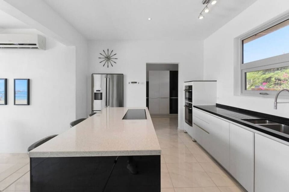 Welcome to the heart of culinary excellence. Our impeccably designed kitchen is a haven for food enthusiasts, boasting a sleek and modern aesthetic.