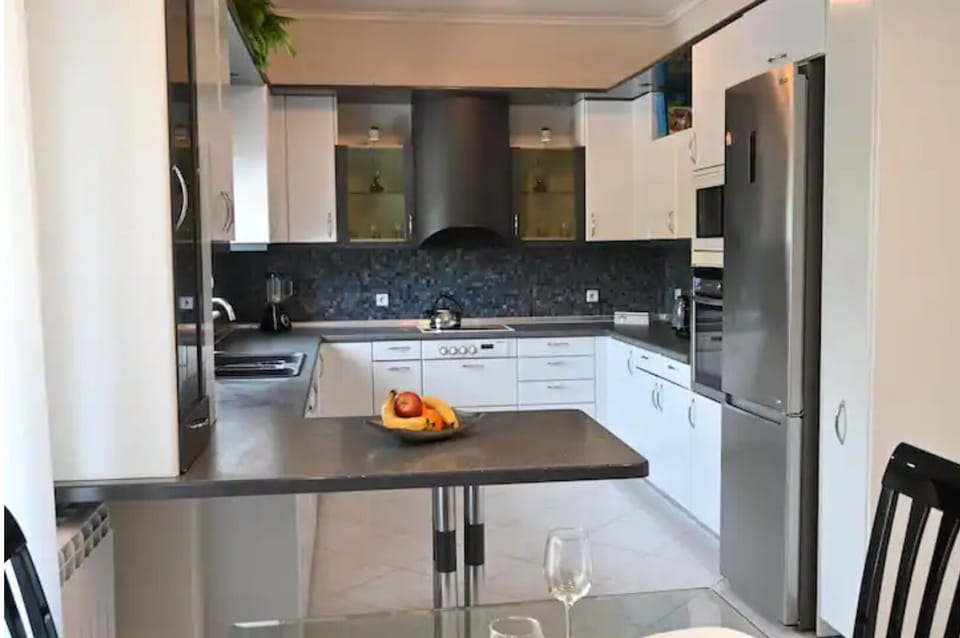 kitchen with all the equipment that you need to cook 