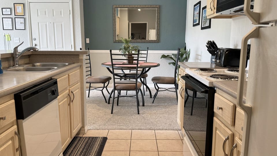 Fully Equipprd Kitchen With Range and Refigerator !