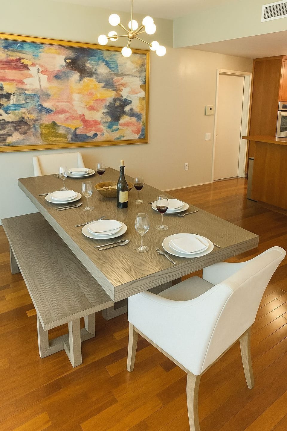 New, spacious dining table comfortably seats at up to 8 guests, with additional stools at the kitchen bar for even more seating.