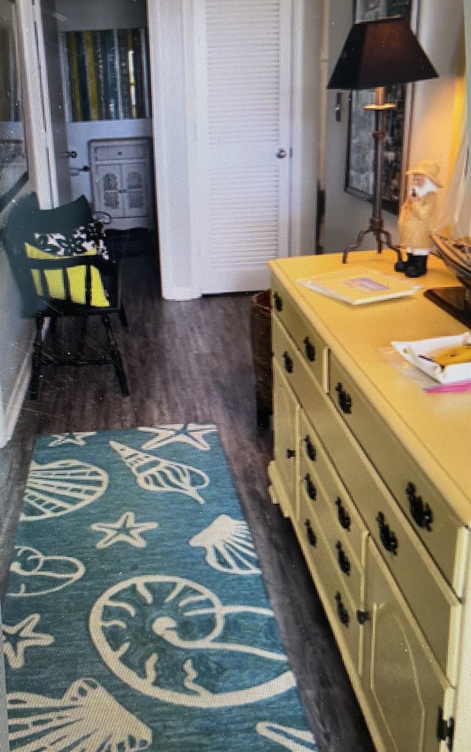 Hall entrance with empty dresser if needed.