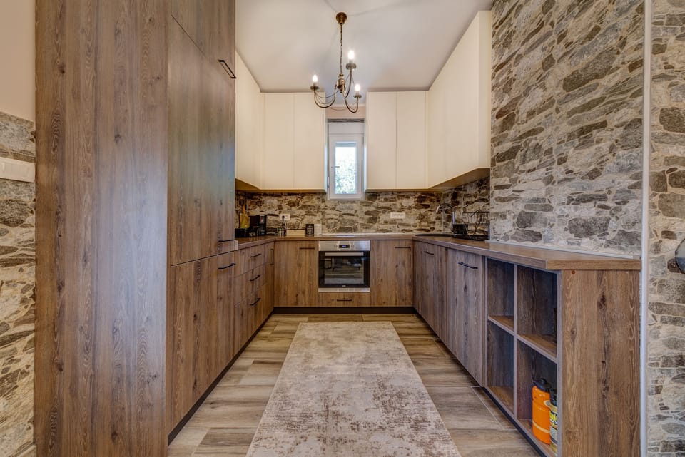 Modern designed and fully-equipped kitchen has everything you need 