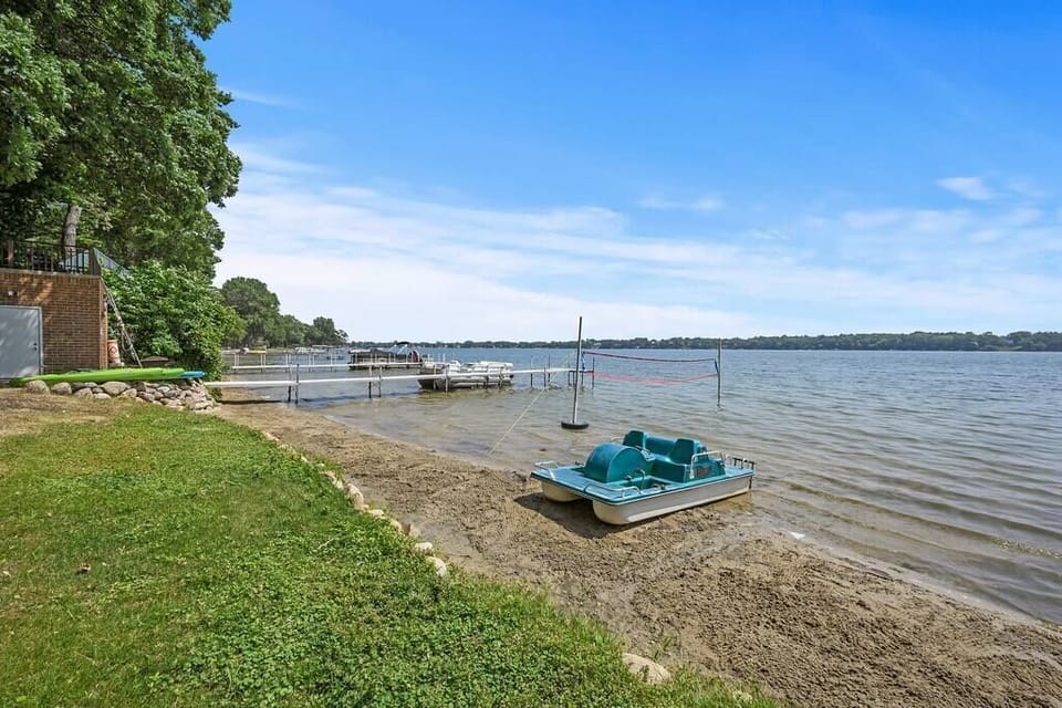 Kayaks, paddle boards, and a paddleboat are all available for guests to use,