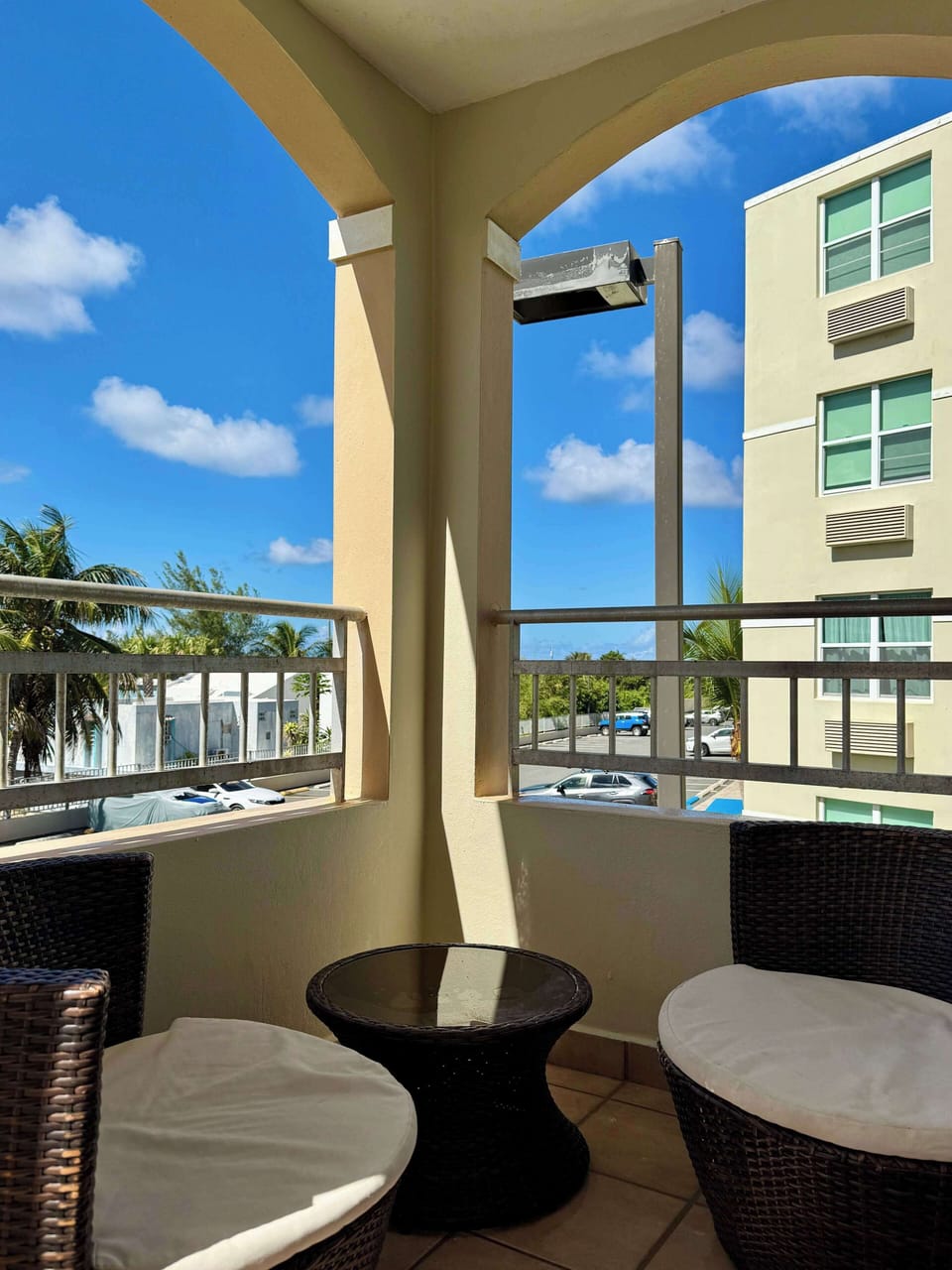 Balcony facing the parking and garden