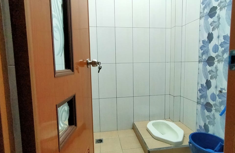 Deluxe Single Room | Bathroom | Towels