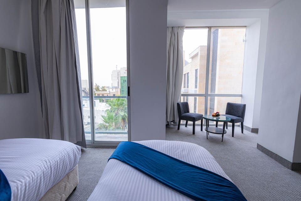 Deluxe Twin Room | In-room safe, blackout drapes, soundproofing, iron/ironing board