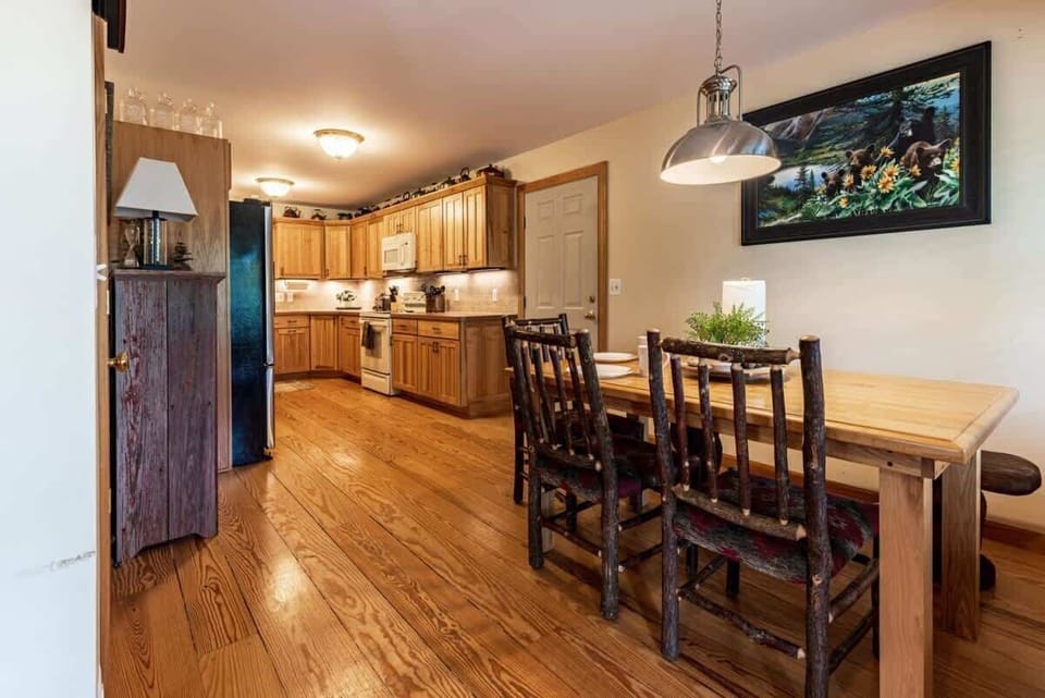 Dining area with seating for the group, right off the kitchen and open to the main living space for easy flow during meals