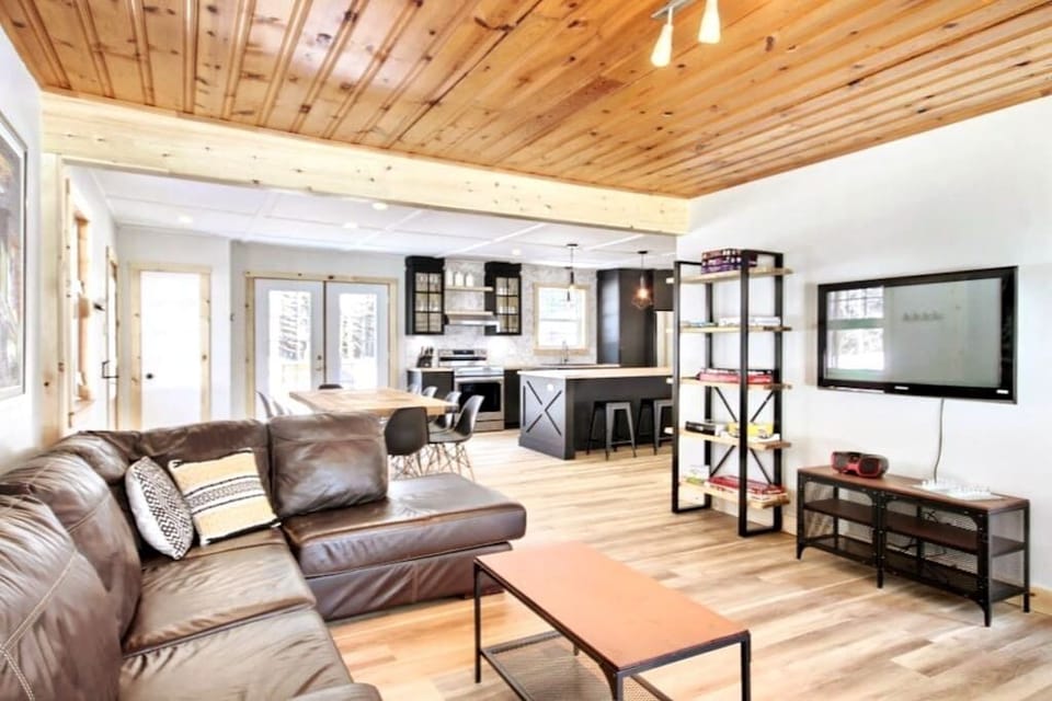 Living room, dining table and kitchen