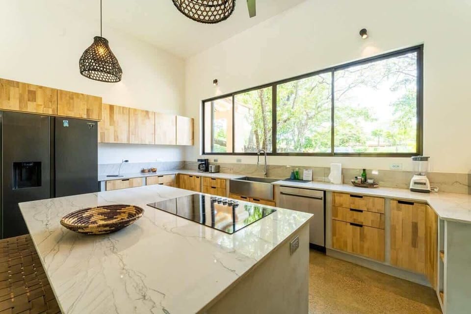Open kitchen, stainless steel appliances