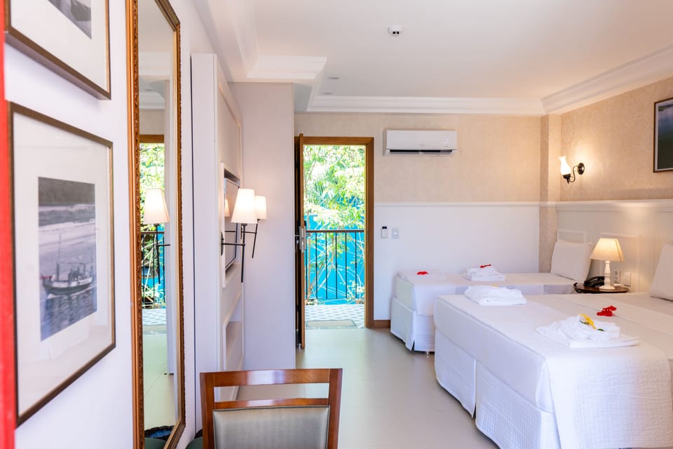 Suíte Classic Triplo Superior | 1 bedroom, laptop workspace, soundproofing, free WiFi