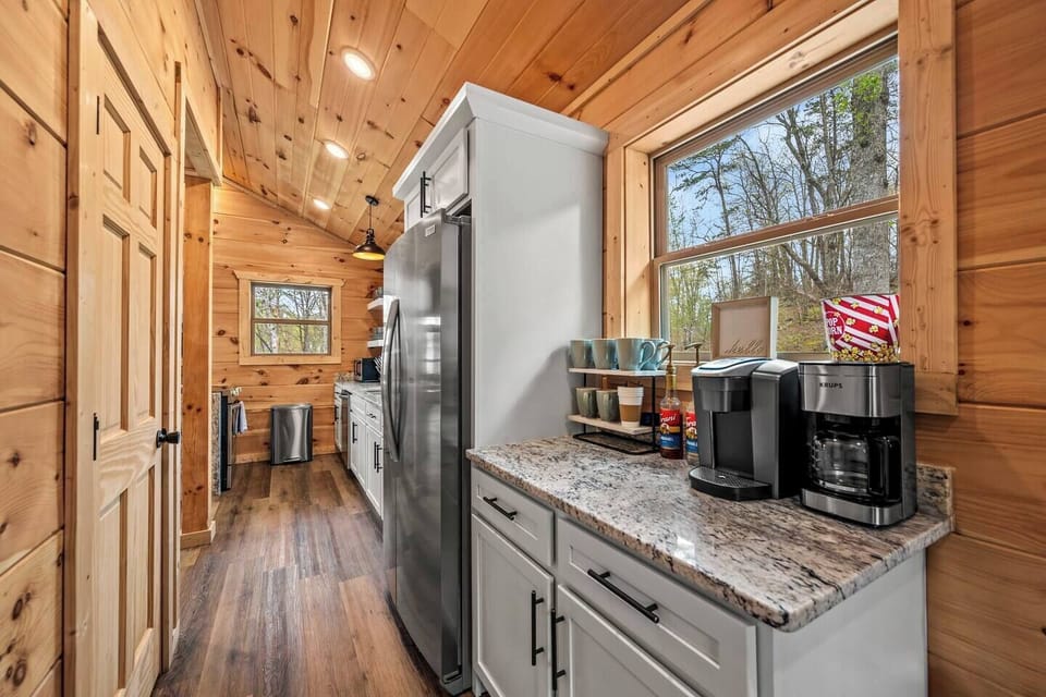 Coffee bar and full-sized fridge/freezer.