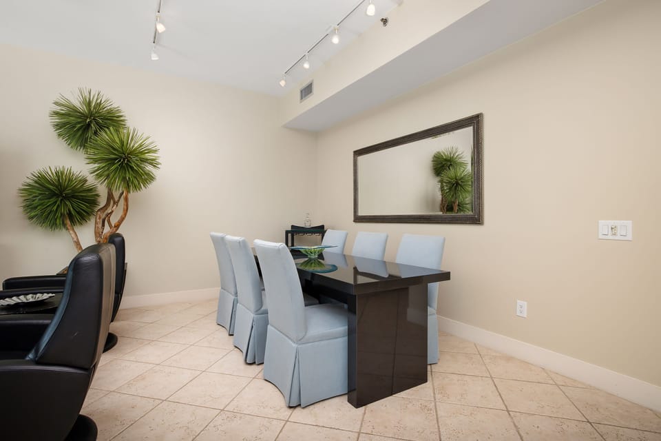 Elegant dining area with seating for six, perfect for family meals or entertaining.