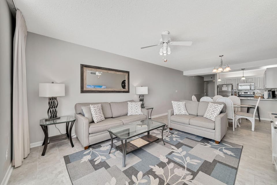 Condo, Multiple Beds, Balcony, Ocean View | Living area | 43-inch flat-screen TV with cable channels, TV
