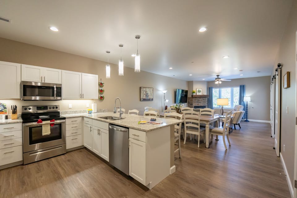 View of Kitchen, Dining, and Living Room