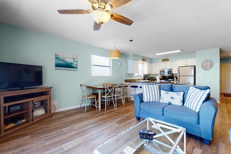Condo, Multiple Beds, Balcony | Living area | 42-inch flat-screen TV with cable channels, TV